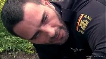 The policeman imposes his force with his big truncheon