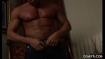 Well endowed guy jerks off on the couch at home