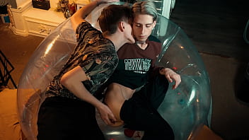  Two sweet guys share an inflatable chair.