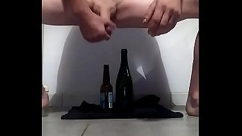 A man really loves beer and wine. changing bottles