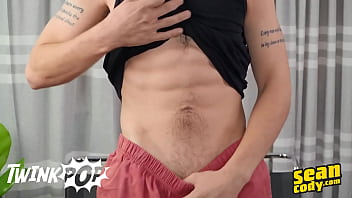  Horny willy lies back on the couch and strokes his cock until he cums on his belly – twinkpop