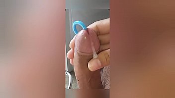 Putting on ball stretchers & cumshots