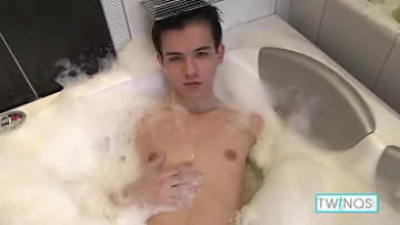  Xander’s Soapy Handjob Session in The Bathtub Ends With a Gaping Cumshot!